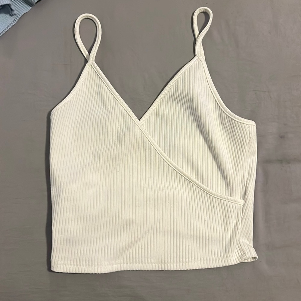 crossed cream/white top